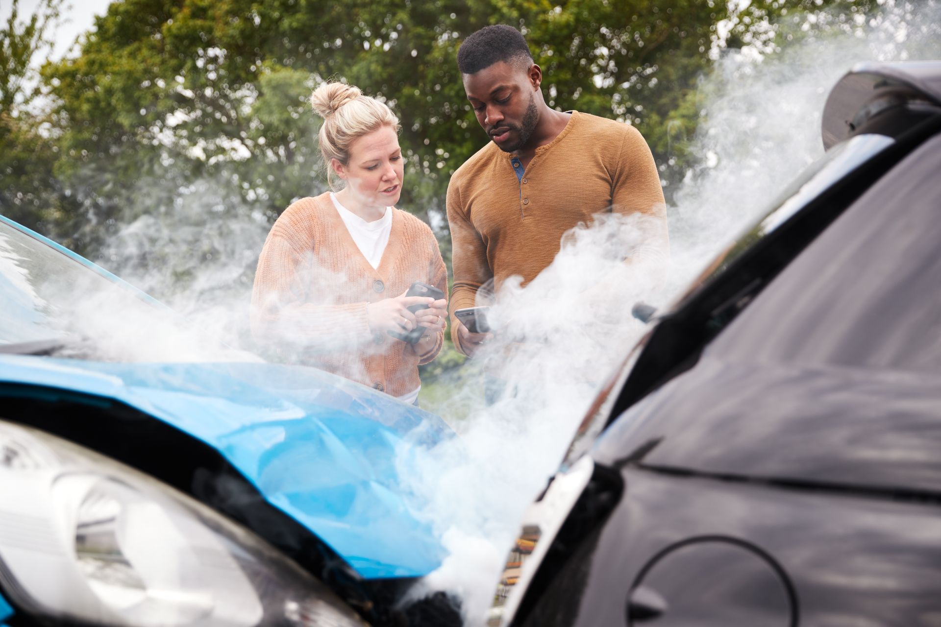 two motorists swapping insurance details on mobile 2024 10 19 12 37 09 utc 2880w